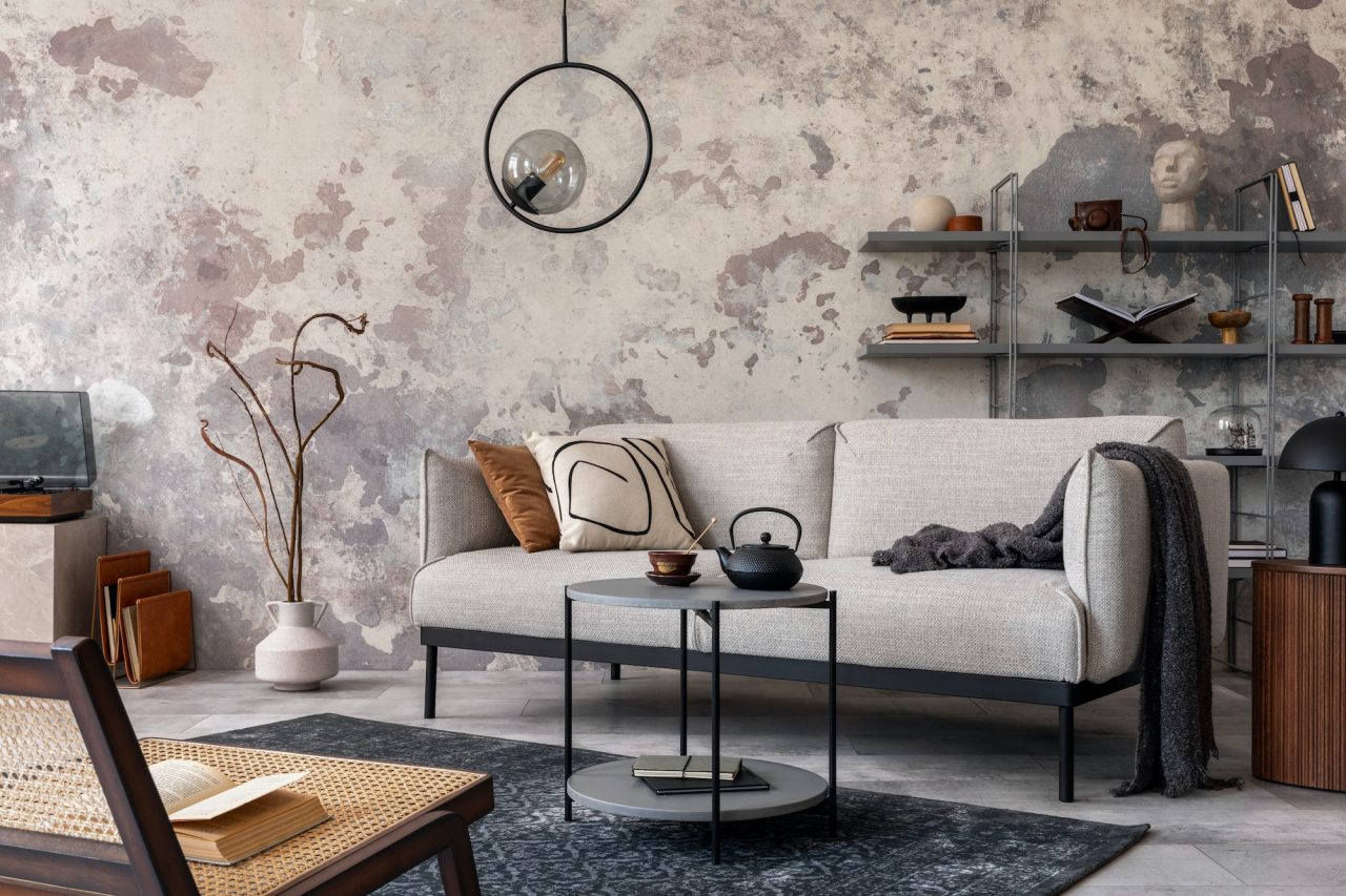 loft-style-of-modern-apartment-with-grey-design-sofa-armchairs-ladder-black-coffee-table-.jpg